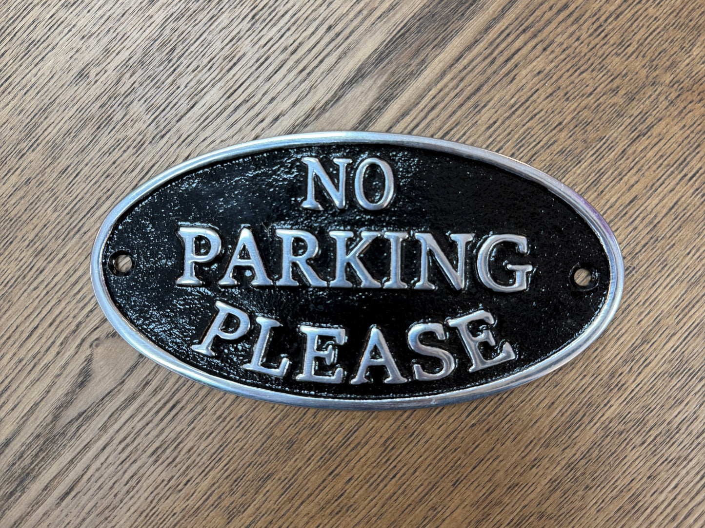 No parking please sign