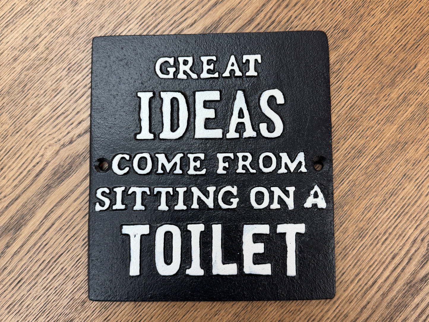 Great ideas come from sitting on a toilet sign