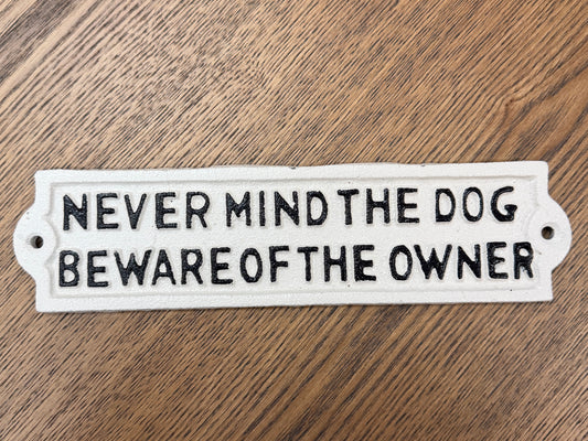 Never mind the dog beware of the owner sign