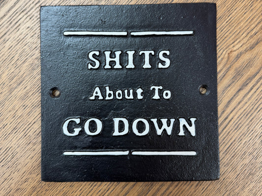 S**ts about to go down sign